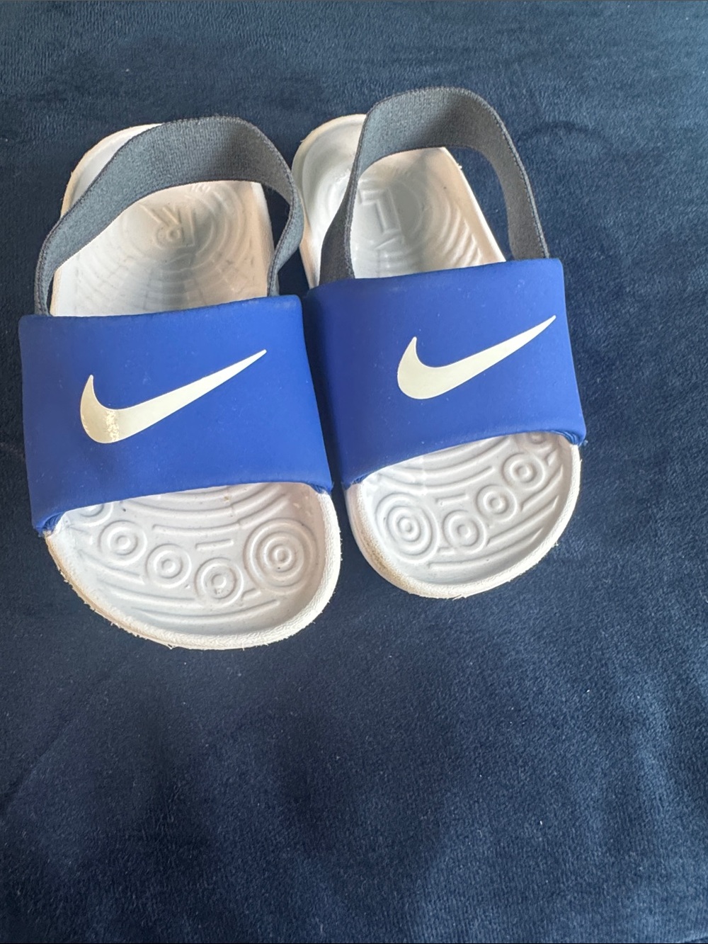 Nike Kids Blue Slide Sandals with White Swoosh and Gray Heel Strap